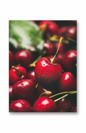 Fresh sweet cherry texture, wallpaper and background. Wet sweet cherries, selective focus, close-up. Summer food or local market produce concept