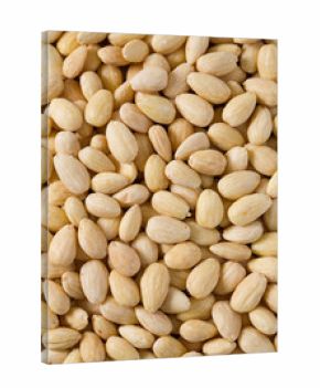 peeled almonds on wooden surface