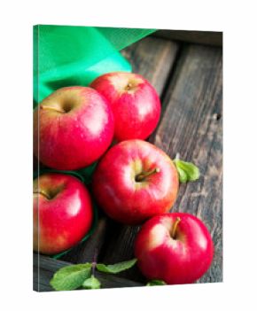 group of red apples on wooden natural background, fresh natural food and vitamins concept in rustic style