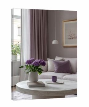 A cozy living room featuring soft lavender hues, decorative pillows, a circular coffee table, and fresh flowers, creating a serene and inviting atmosphere.
