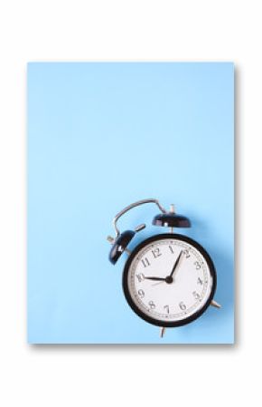 A black alarm clock on a blue background forming a page border