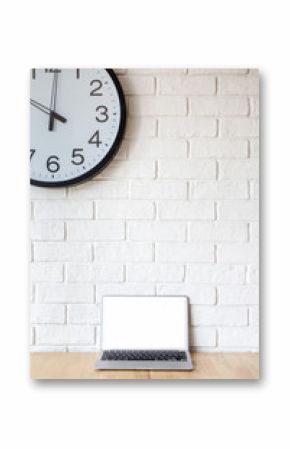 Laptop on table,with white brick wall background,blank screen, clock