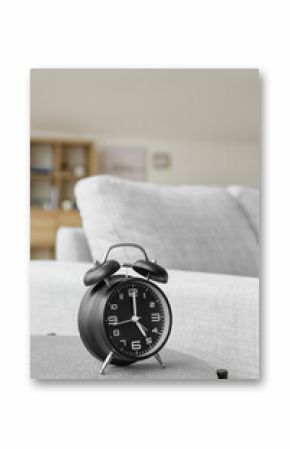 Alarm clock on table in room