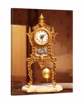 ancient vintage golden brass pendulum clock