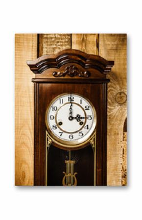 old and big clock hanging on a wooden wall