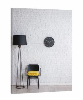 black lamp, chair and clock on the brick wall interior concept