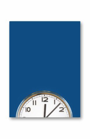 Big white plain wall clock on trending dark blue background. Ten o'clock. Close up with copy space, time management or school concept and summer standard or winter time change, opening hours.