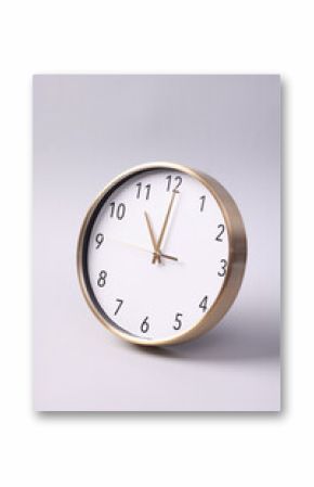 Close-up of a wall clock. The concept of time and work time is valuable for life, Alarm clock stopped. photo in a coloured background