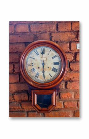 old wall clock in a brick wall