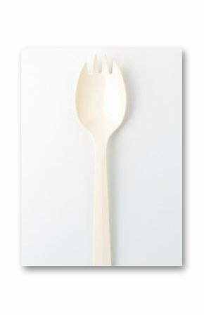 Plastic spork on white background