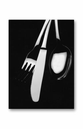 photo of black and white kitchen cutlery
