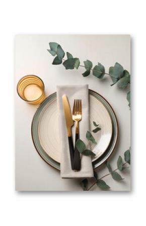 Stylish setting with cutlery, napkin, eucalyptus branch and plates on light table, top view