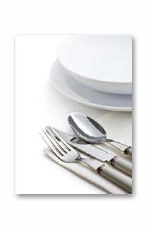 silver cutlery and plates