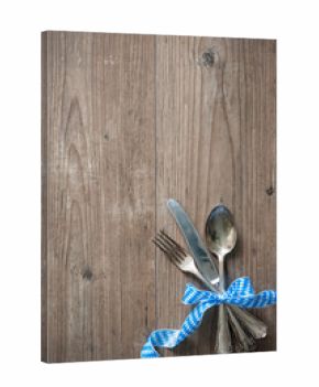 Bavarian cutlery on wooden table with copy space