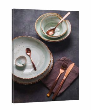 Set of modern tableware. Plates and cutlery