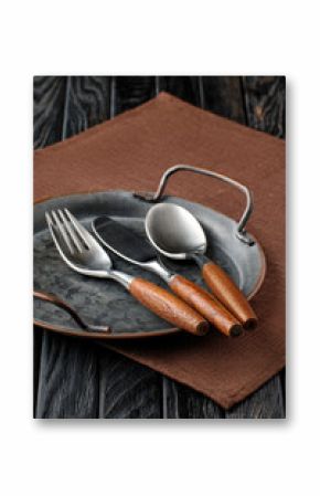 Stylish cutlery set of knife, spoon, fork with wooden handle