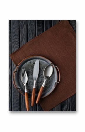 Stylish cutlery set of knife, spoon, fork with wooden handle