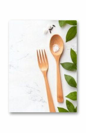 Minimalist Scene of Bamboo Cutlery on Organic Table