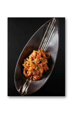 Closeup of duck intestines on a plate