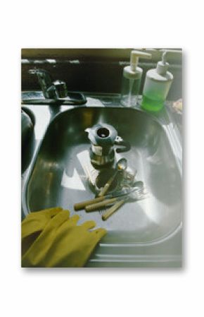 Sunlit Kitchen Sink with Moka Pot and Used Utensils