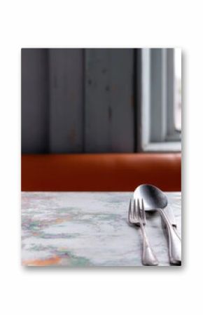 Rusty Fork and Spoon on a Weathered Table