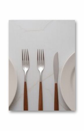 Elegant table setting with wooden handle cutlery for fine dining meals