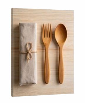 Wooden fork and spoon with rolled napkin on wood cutlery