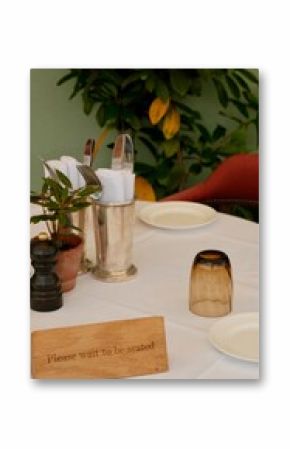 Elegant Outdoor Table with Seating Sign 
