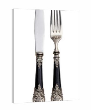 Elegant silverware set, knife and fork.  Black handles, ornate silver accents
