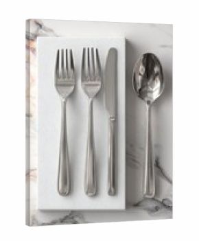 Stainless steel cutlery set on white marble