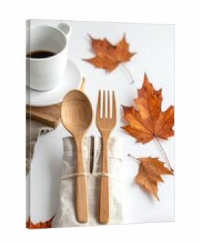 Autumn table setting wooden cutlery, coffee, maple leaves
