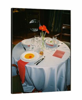 A table decorated with elegant tableware in an exclusive restaurant