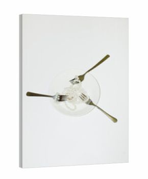 Conceptual image of eating jewellery pearls with fork cutlery & plate