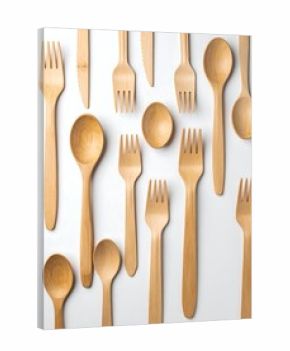 Wooden cutlery arranged on white background