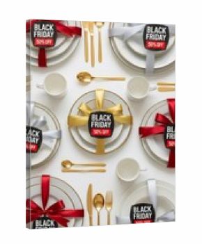 Black Friday sale of dinnerware set with gold cutlery and ribbon for celebratory meal discount event