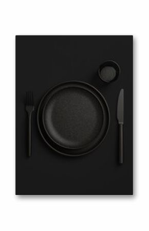 Black table setting with plate, two forks, knife, napkin, and coaster on dark background
