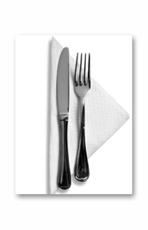Fork and knife on napkin