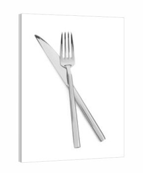 Fork and knife isolated on white, top view. Stylish shiny cutlery set
