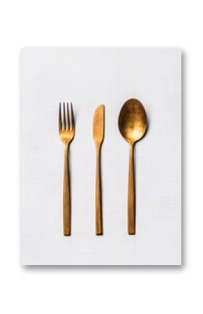 golden cutlery set on white background