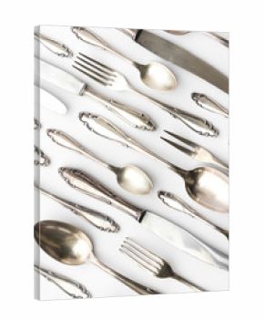   silver cutlery collection on white background