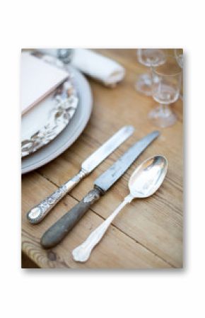 Vintage cutlery on wooden table