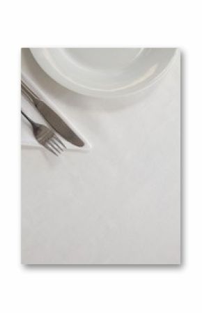 Plate and cutlery set on a table 