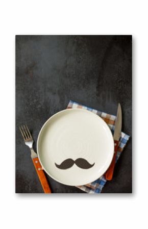 Happy fathers day concept. Table setting - plate, cutlery and napkin on grey stone table. Top view flat lay background with copy space.