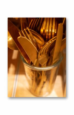 gold coloured cutlery 