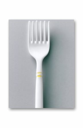 White Plastic Fork on Grey Surface