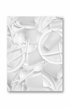 close up of plastic cutlery spoon, fork, knife, plate and cup on white background