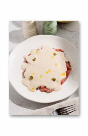 Veal with creamy sauce and capers