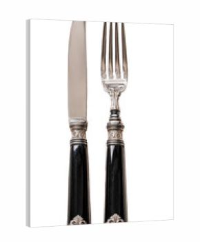 Elegant silver cutlery set with dark handles