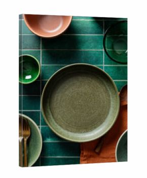 Elegant table setting with ceramic dishes and cutlery