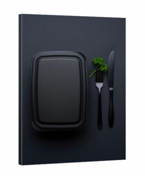 Black container with cutlery and parsley on a dark background for food presentation